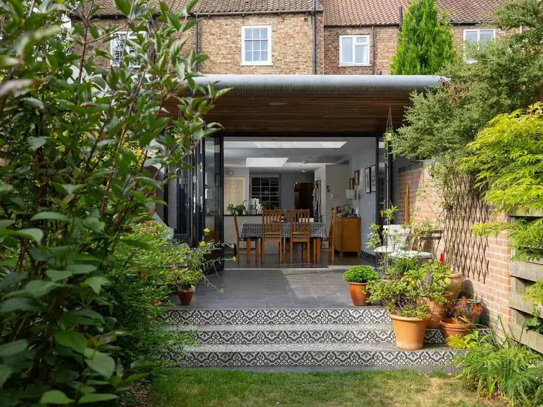 Exterior of modern single-storey rear extension to Grade II listed terrace house, York