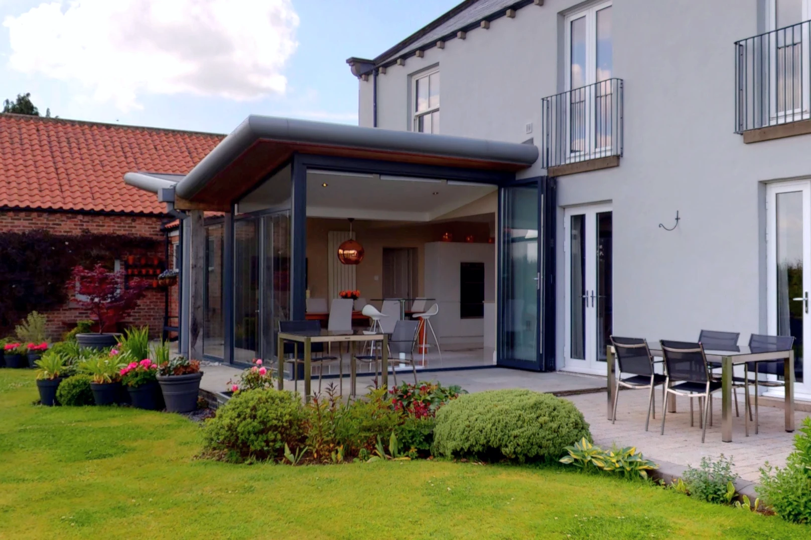 Contemporary Single Storey Extension Butterfly Roof Rounded Fascia Side Elevation Closeup View