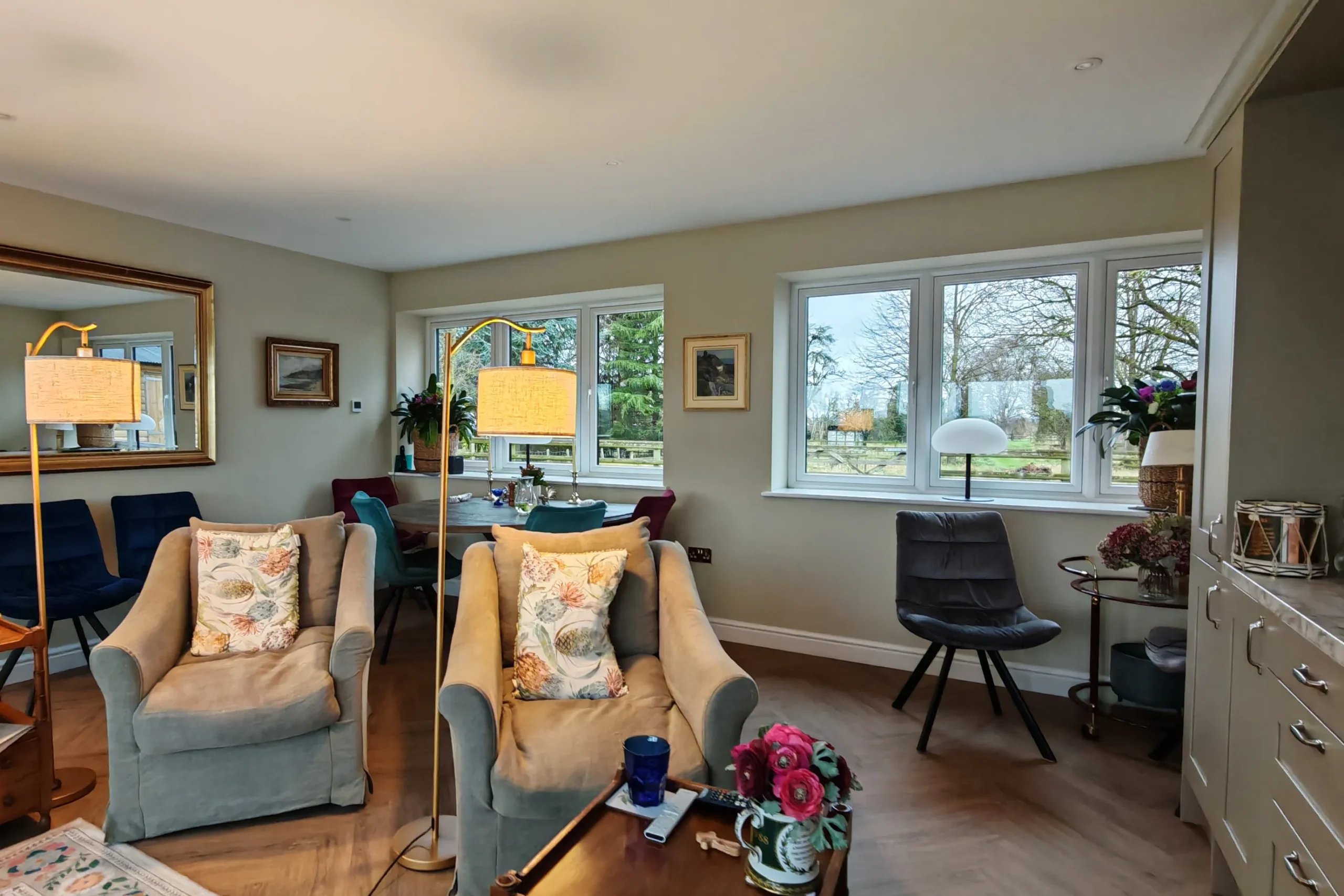 Garage conversion adapting the exisitng garage bay openings and providing spacious living space, in Nether Poppleton, York, North Yorkshire