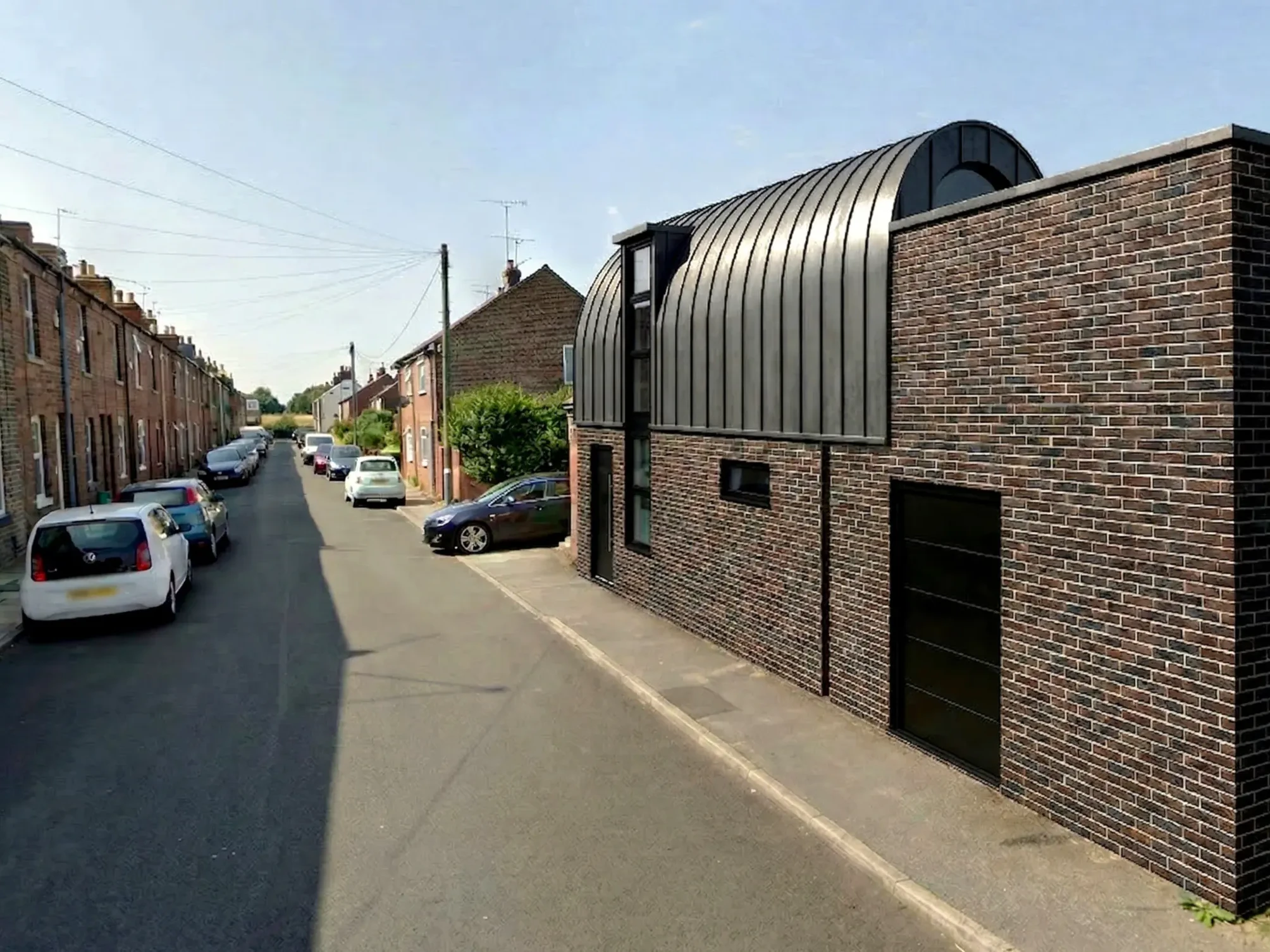 Concept visualisation of a contemporary zinc-roofed dwelling proposed for Poplar Street, Holgate, York, by Fining Associates