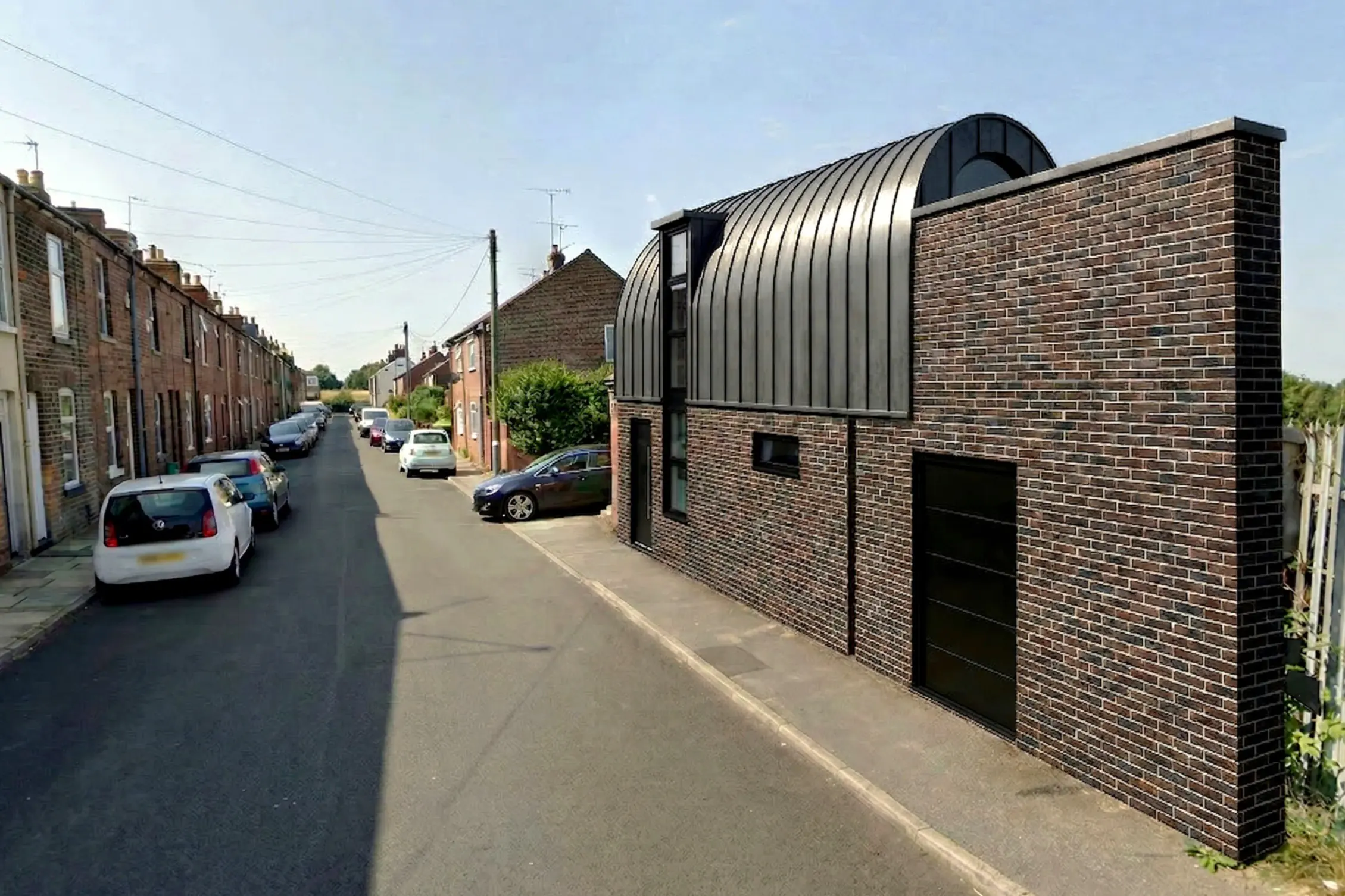 Concept visualisation of a contemporary zinc-roofed dwelling proposed for Poplar Street, Holgate, York, by Fining Associates